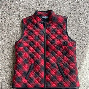 Woman’s plaid vest size large.